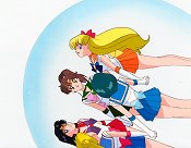 Sailor Venus Leads The Others In An Attack