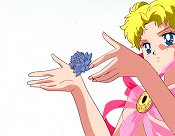 Close-up Of Sailor Moon Lifting The Ginzuishou